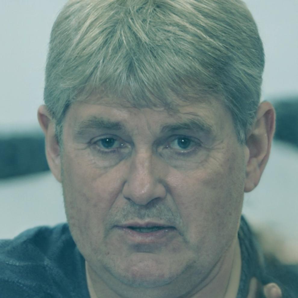 Theron Veldkamp reviewing student portfolio assignments